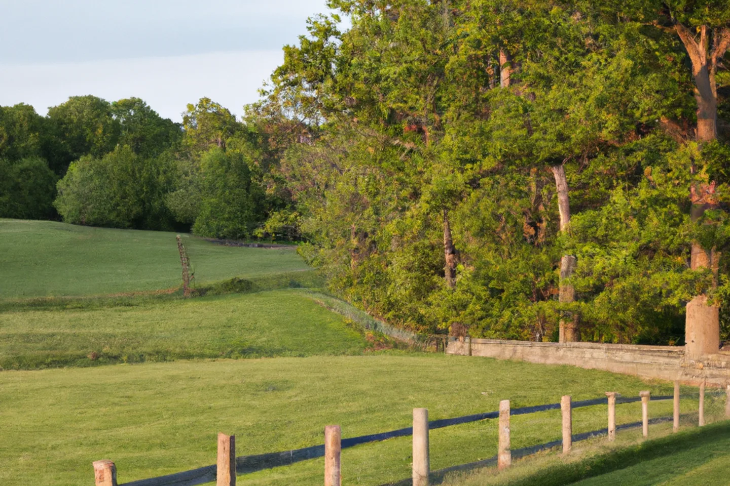 Rolling Indiana farmland with a split-rail fence along a quiet country road